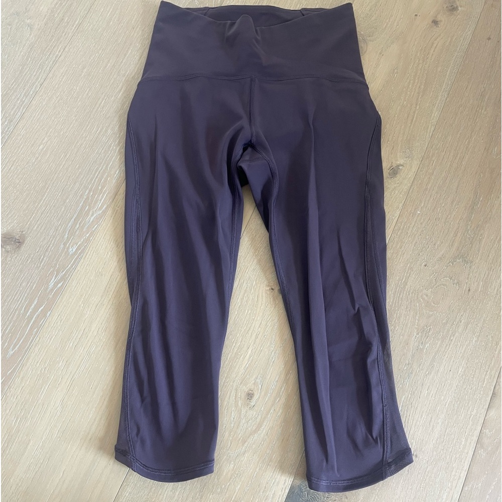 Lululemon capri leggings with mesh side size 4